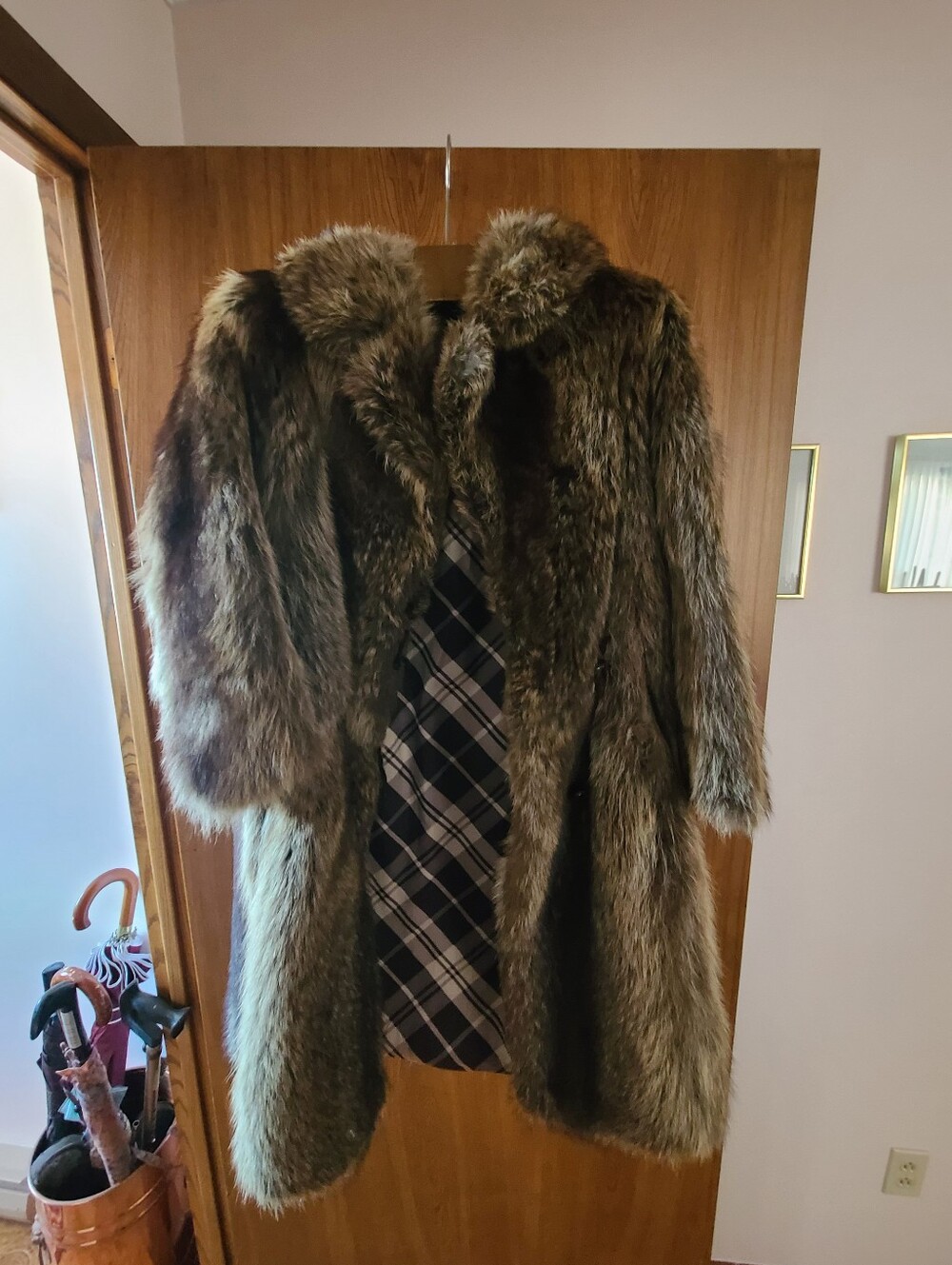 Two racoon fur coats